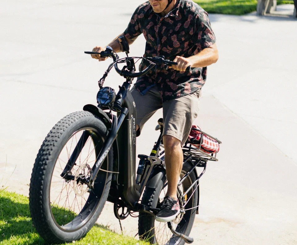 Electric bike with durable fat tires designed for enhanced off-road performance and superior traction.