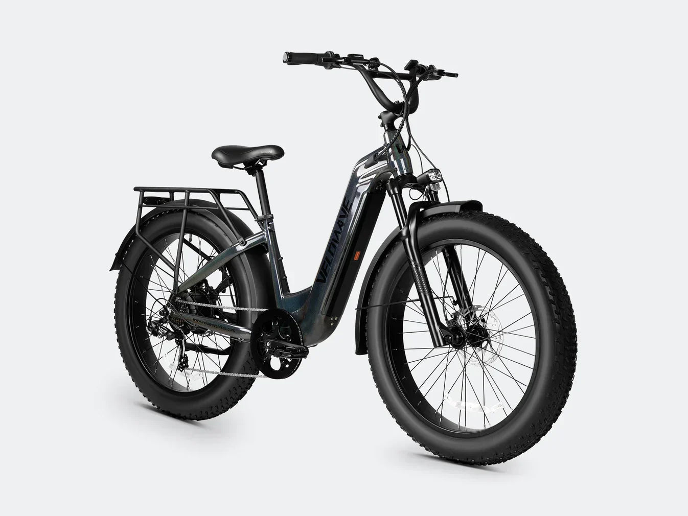 Electric bike with step thru frame and fat tire design for enhanced stability and comfort.