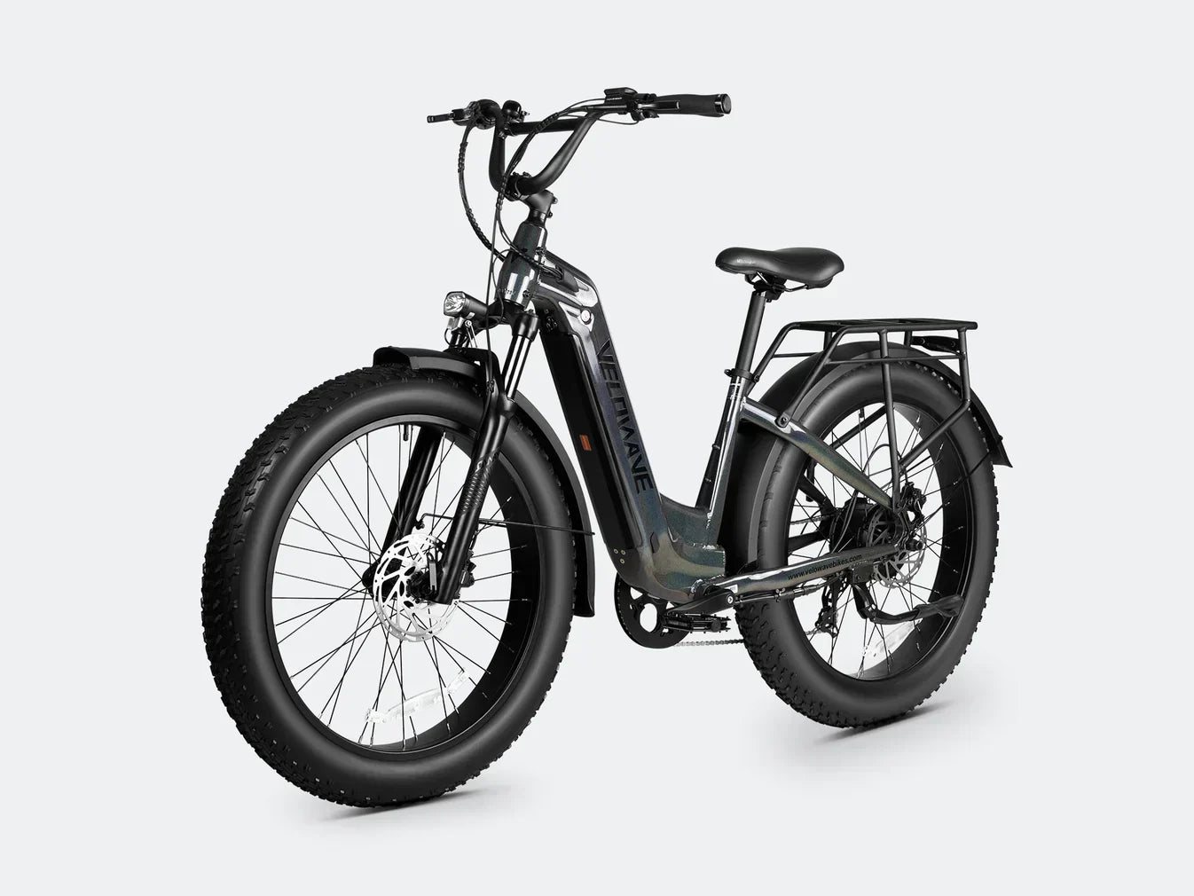 Electric bike with step thru frame and fat tire design for enhanced stability and comfort.