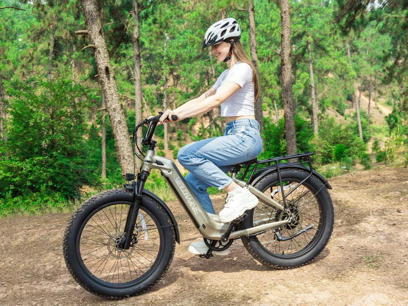 Fat tire electric bike with step thru design, ideal for comfortable and versatile riding on various terrains